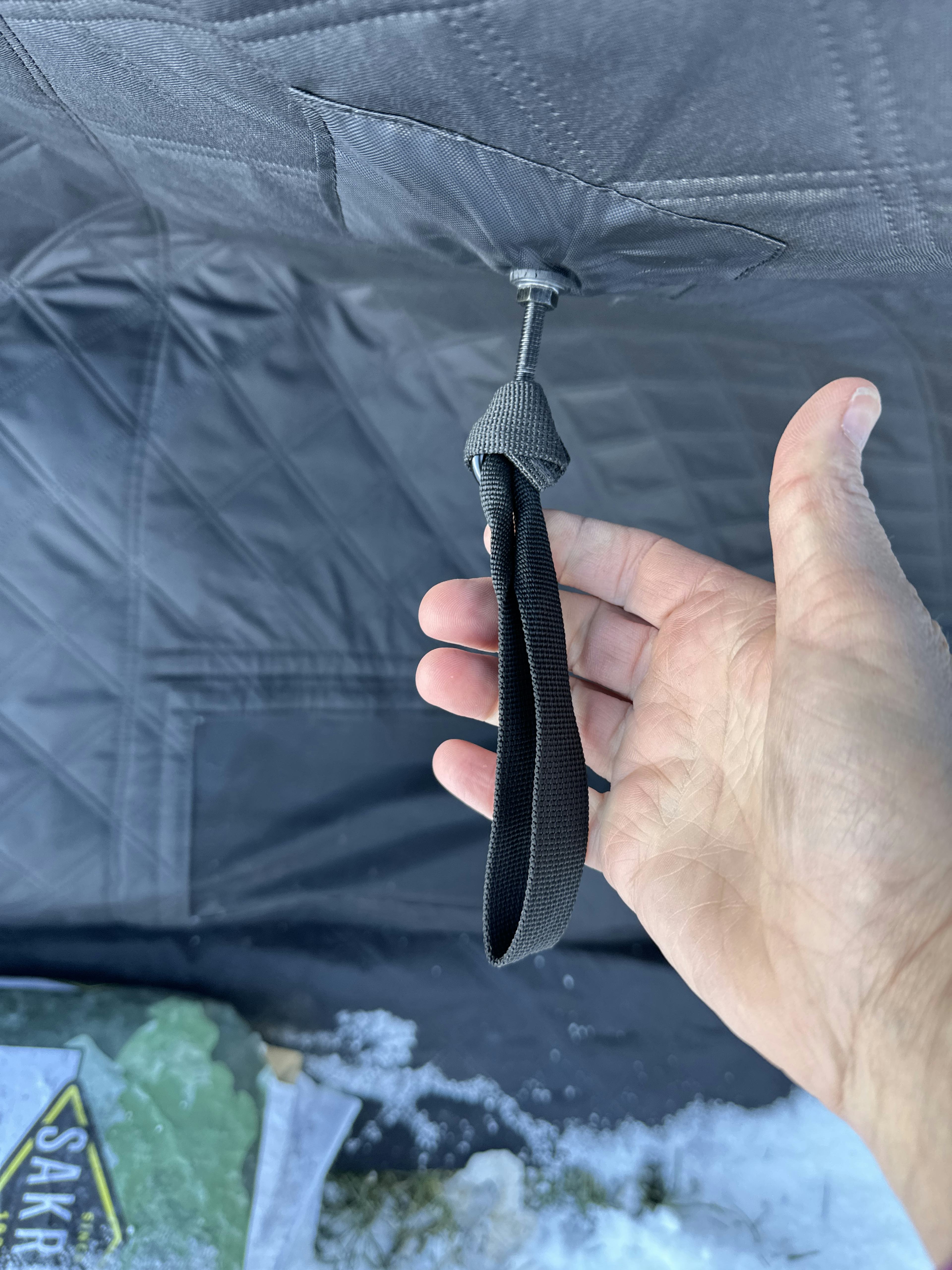 Unscrewed the tie down loop on outside of tent
